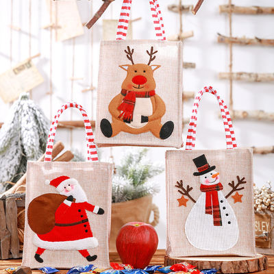 Papá Noel hombre de nieve alce regalo de Navidad Línano rayado colgando la pierna Tote con logotipo personalizado