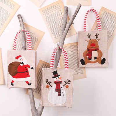 Papá Noel hombre de nieve alce regalo de Navidad Línano rayado colgando la pierna Tote con logotipo personalizado