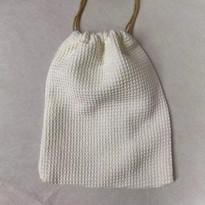Producto OEM/ODM aceptado Bolsa de almacenamiento cosmético de tejido de gofres en blanco para necesidades de cuidado de la piel