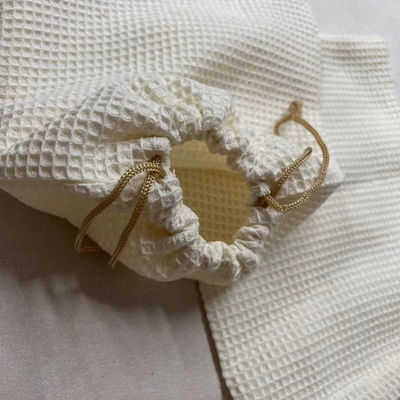 Producto OEM/ODM aceptado Bolsa de almacenamiento cosmético de tejido de gofres en blanco para necesidades de cuidado de la piel