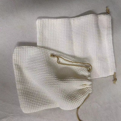 Producto OEM/ODM aceptado Bolsa de almacenamiento cosmético de tejido de gofres en blanco para necesidades de cuidado de la piel