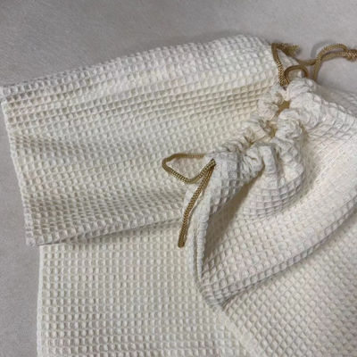 Producto OEM/ODM aceptado Bolsa de almacenamiento cosmético de tejido de gofres en blanco para necesidades de cuidado de la piel