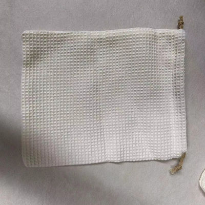Producto OEM/ODM aceptado Bolsa de almacenamiento cosmético de tejido de gofres en blanco para necesidades de cuidado de la piel