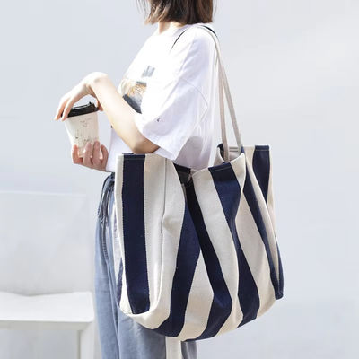 Bolso de lienzo de algodón de color personalizado para compras OEM / ODM aceptable Bolso de toque rayado