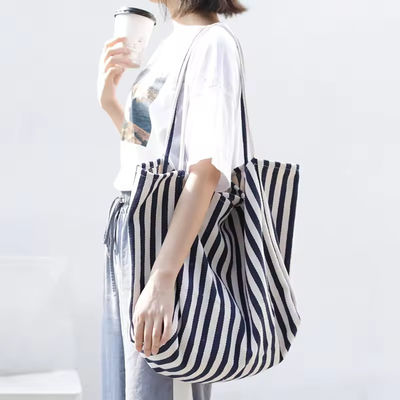 Bolso de lienzo de algodón de color personalizado para compras OEM / ODM aceptable Bolso de toque rayado