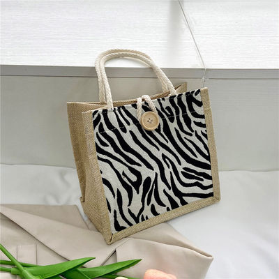 Estilo de embrague de lienzo ecológico de baja calidad reciclable simple regalo de Hessian Mini bolsas de yute