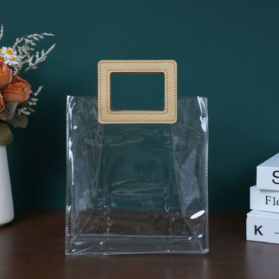 Bolso de playa para mujeres de viaje y salida Bolso de compras de PVC transparente con mango de cuero