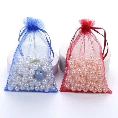 Logotipo Bolsas de organza de bucle suave personalizables Bolsas de cuerda de tira pequeñas para el embalaje de joyas
