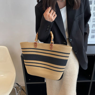 Mujeres con estilo bolso de paja de playa tejido bolso de mano casual hecho a mano bolsos de hombro huecos de ratán