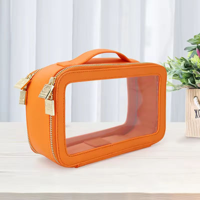 Bolso de baño de cuero de PU de viaje pequeño e impermeable con maquillaje de PVC de color personalizado