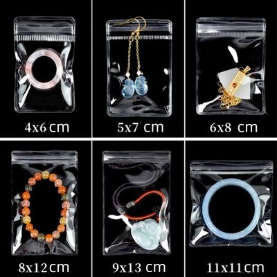 Bolsa de embalaje de joyas con cerradura de cremallera de PVC con mini bolso de cremallera transparente con logotipo reutilizable