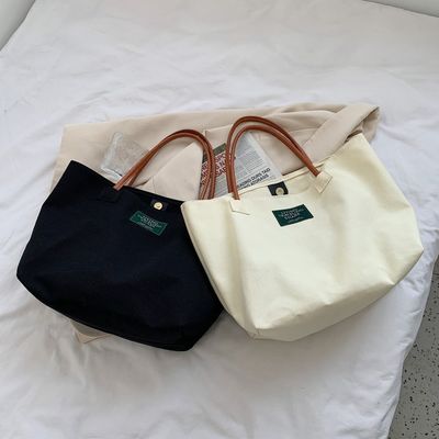 Última moda logotipo personalizado lienzo bolsillo de gran capacidad estudiante bolso de hombro único