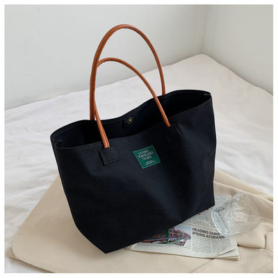 Última moda logotipo personalizado lienzo bolsillo de gran capacidad estudiante bolso de hombro único