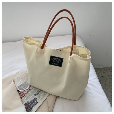 Última moda logotipo personalizado lienzo bolsillo de gran capacidad estudiante bolso de hombro único