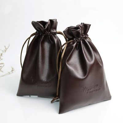 Bolso de tamaño medio Logotipo personalizado de pieles de PU Bolso de joyería Bolso de cuerda para almacenamiento de alta clase