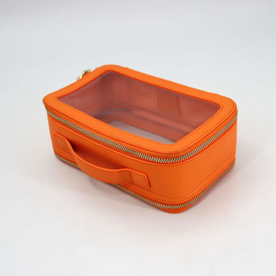 Bolso de baño de cuero de PU de viaje pequeño e impermeable con maquillaje de PVC de color personalizado