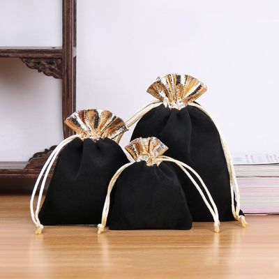 Bolso de embalaje de terciopelo pequeño de lujo Cordón de tracción personalizado para joyas y cosméticos