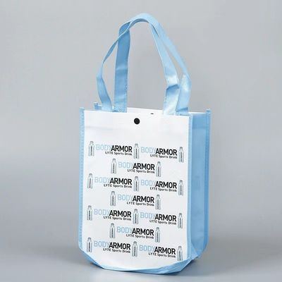 Bolsa de toque de esquinas curvas de tamaño mediano en material laminado no tejido para compras personalizadas