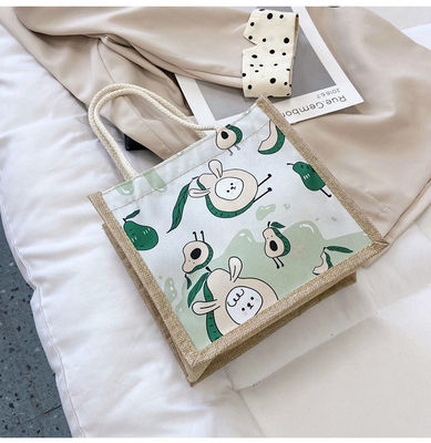 2024 Coreano Ins Simple Estudiante dibujos animados de lienzo bolsos de mano de las damas Mini bolsos para niñas