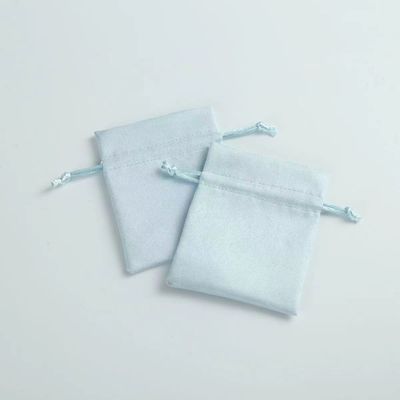Acceptable OEM/ODM Bolso de cordón de terciopelo azul claro personalizado para la organización de joyería