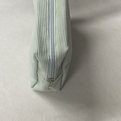 Bolso de maquillaje personalizado con logotipo privado de corduroy a rayas para mujeres con el estilo más moderno