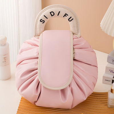 Diseño de logotipo personalizado Bolsa de maquillaje de PVC Tipo de patrón sólido de cuerda de tira Bolsa de viaje de artículos de tocador