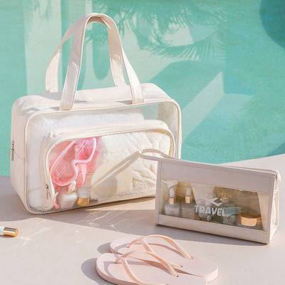 El logotipo personalizado de moda más reciente aceptado PVC Cosmético Bolsa de cremallera para artículos de tocador de viaje