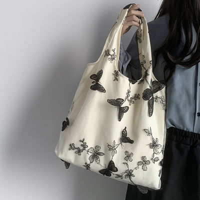 Material de revestimiento de poliéster unisex versión coreana Bolso de hombro de vaca con impresión de mariposa
