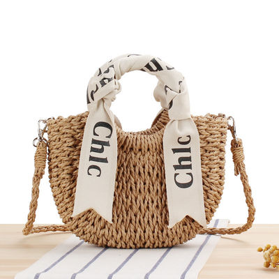 Logotipo personalizado aceptado chaleco de seda bolsa de viaje de vacaciones con material tejido de paja portátil