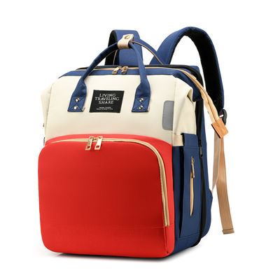 Práctica moda multifunción de gran capacidad impermeable bolso de pañales para bebés mochila con cama