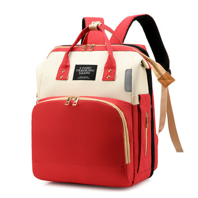 Práctica moda multifunción de gran capacidad impermeable bolso de pañales para bebés mochila con cama