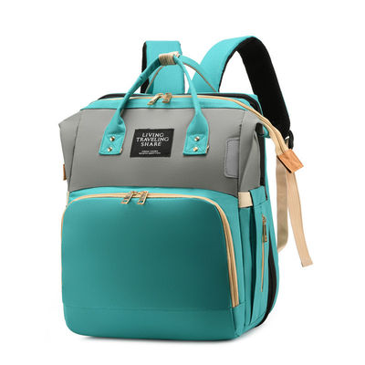 Práctica moda multifunción de gran capacidad impermeable bolso de pañales para bebés mochila con cama