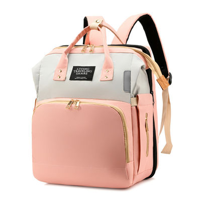 Práctica moda multifunción de gran capacidad impermeable bolso de pañales para bebés mochila con cama
