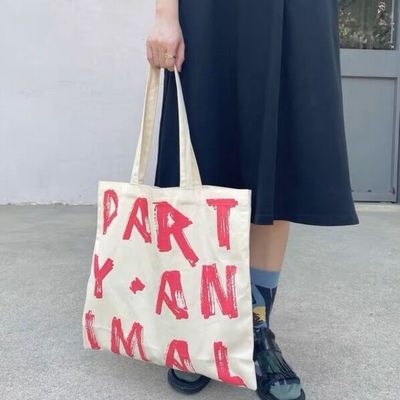 Más nuevo estilo de moda mujer de un hombro simple OEM impresión bolsa de compras para mujeres
