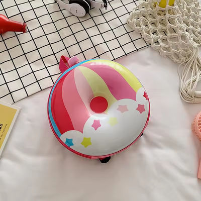 Novedad Bolsa de libros linda 2024 Mochila de dibujos animados Donuts Bolsa escolar de cáscara de goma para la vida cotidiana