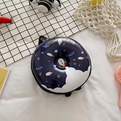 Novedad Bolsa de libros linda 2024 Mochila de dibujos animados Donuts Bolsa escolar de cáscara de goma para la vida cotidiana