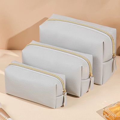 Bolsa de ropa de baño de cuero vegetariano con cierre de cremallera en color personalizado para viajes y cosméticos