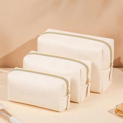 Bolsa de ropa de baño de cuero vegetariano con cierre de cremallera en color personalizado para viajes y cosméticos