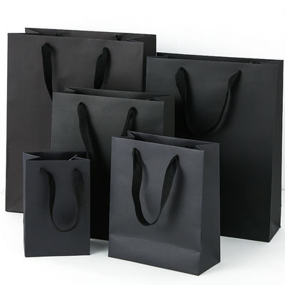 Logotipo impreso personalizado de lujo Boutique de compras bolsas de regalo de papel embalaje de regalo personalizado