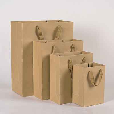Logotipo impreso personalizado de lujo Boutique de compras bolsas de regalo de papel embalaje de regalo personalizado