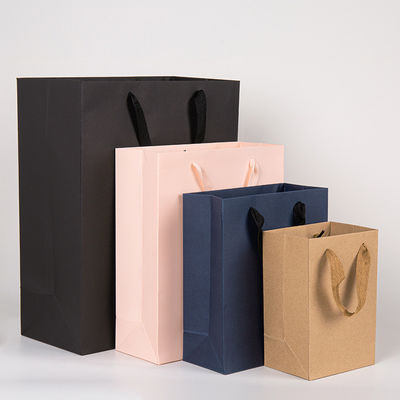 Logotipo impreso personalizado de lujo Boutique de compras bolsas de regalo de papel embalaje de regalo personalizado