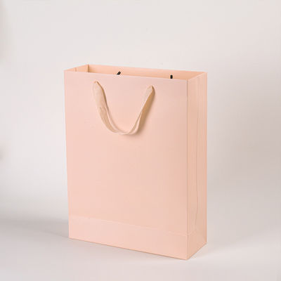 Logotipo impreso personalizado de lujo Boutique de compras bolsas de regalo de papel embalaje de regalo personalizado
