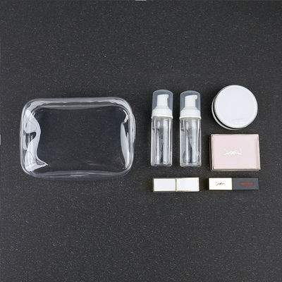 Bolsa de plástico con cremallera de ropa de baño Bolsa cosmética de tamaño personalizado Logotipo Bolsa de maquillaje clara para mujeres Estilo de moda