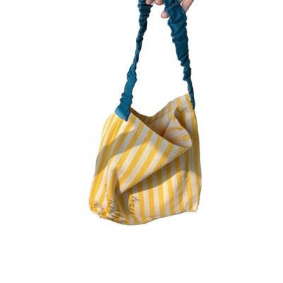 Bolso de hombro de lona de dos manos con rayas contrastantes llamativas