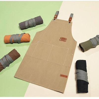 OEM/ODM aceptable delantal de utilidad de lona encerada para jardinería de restaurantes y cafeterías
