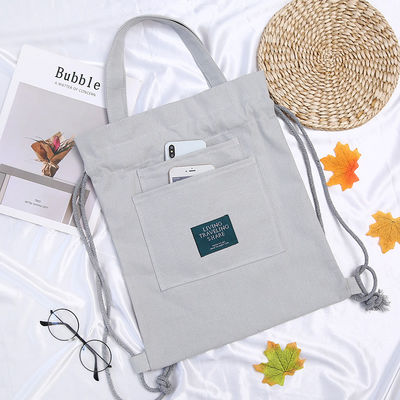 Bolso de mano para estudiantes con logotipo personalizado Mochila de lona con cierre de cinturón y doble...