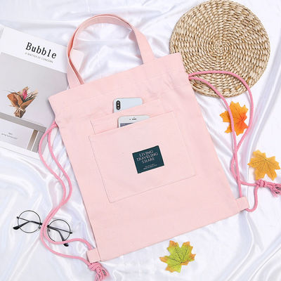 Bolso de mano para estudiantes con logotipo personalizado Mochila de lona con cierre de cinturón y doble...