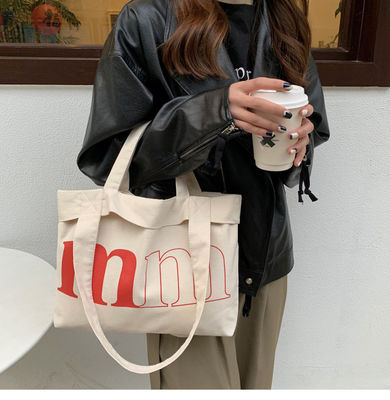 Logotipo personalizado Bolsita de lienzo de carta casual simple para primavera y verano Bolsa de hombro verde