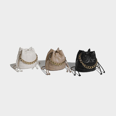 2024 Diseño Moda Cuero Cuerpo Cruzado Uno hombro Bolso Pequeño Bolso de cubo para mujeres