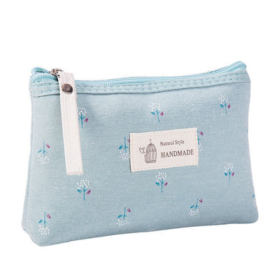 Bolso cosmético portátil personalizable para mujeres Tipo de patrón sólido y material de lona